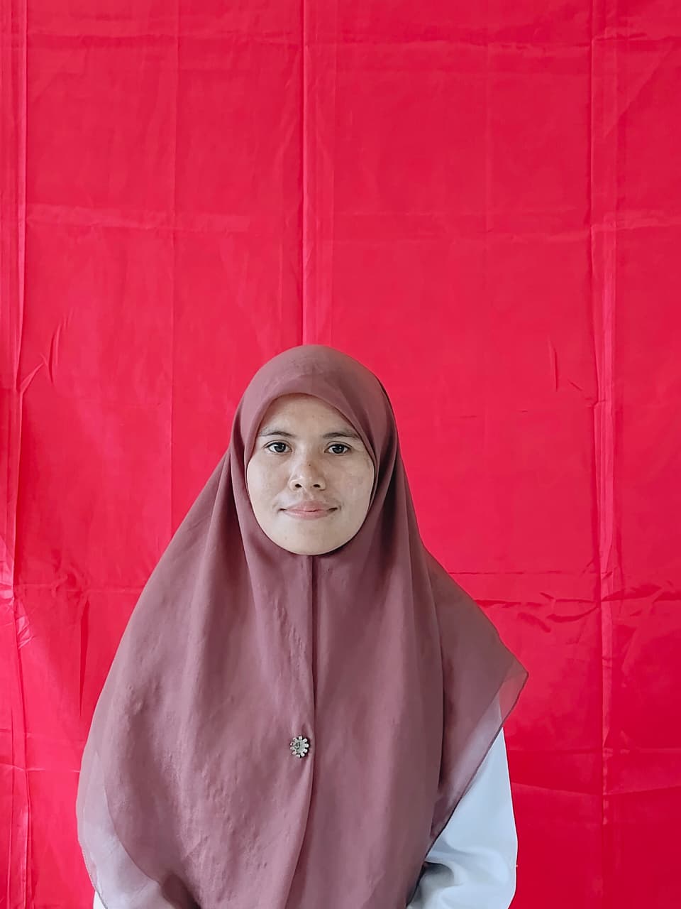 Muthmainah,S.Pd.,Gr